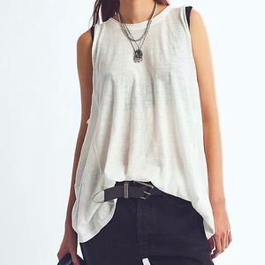 Free people goes w/ anything tunic, sleeveless lightweight good 2 run around in.